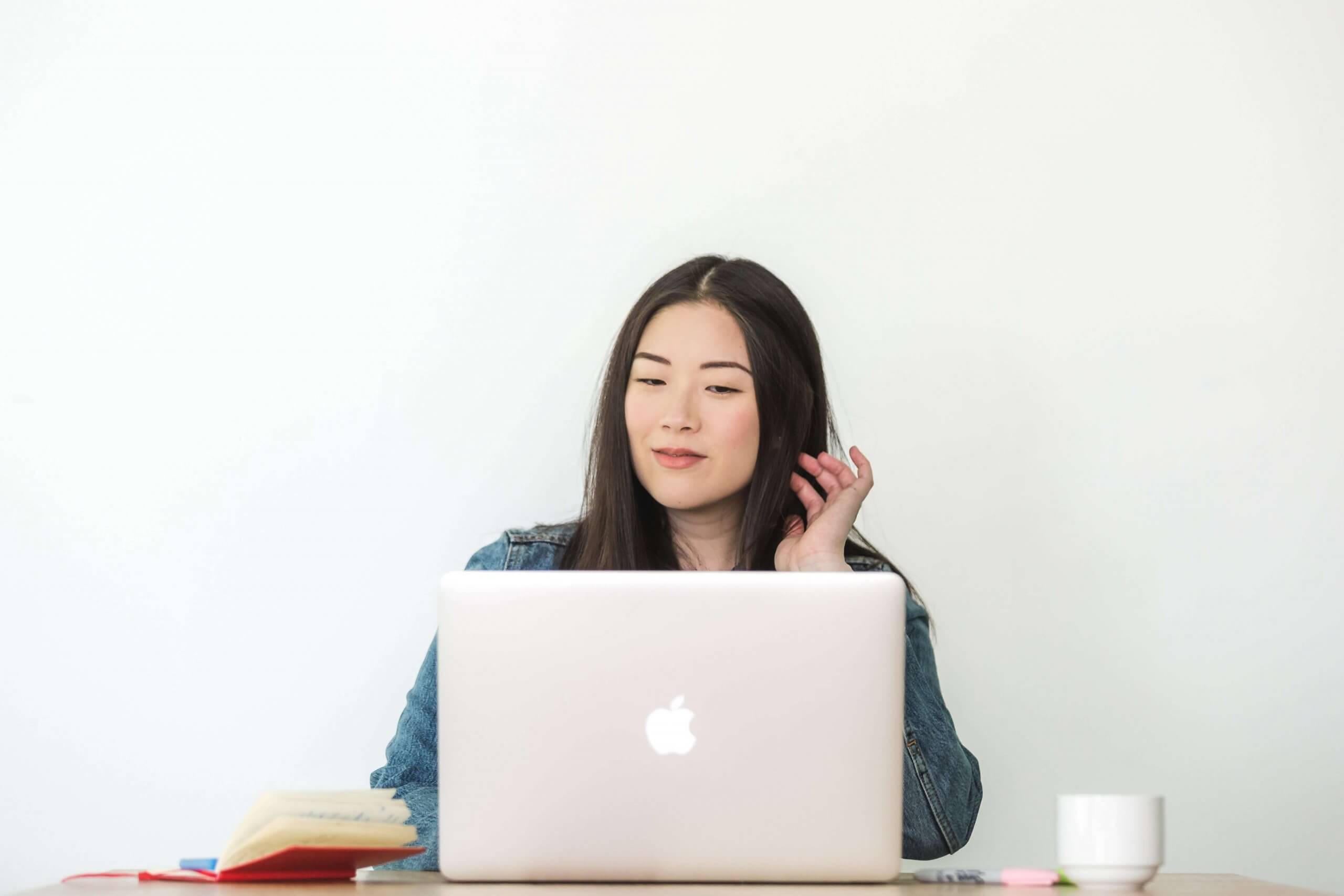 woman reading fertility myths on the internet